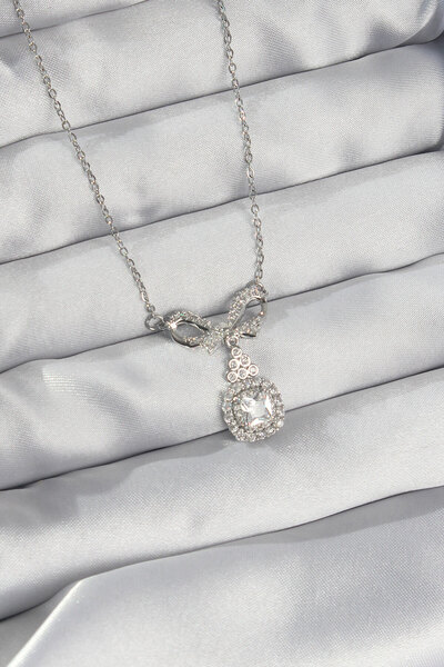 OGHAMAY 316L Steel Silver Color Bow Detail Zircon Stone Solitaire Necklace
