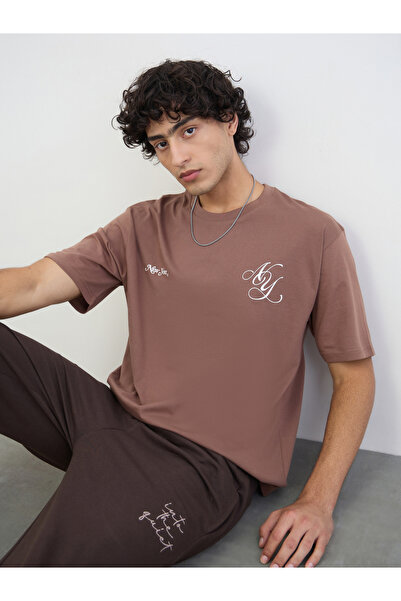 Styli Men Graphic Print Oversized Jersey T-Shirt