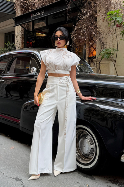 Ortaya Çık Set bluză crop cu imprimeu alb și pantaloni palazzo