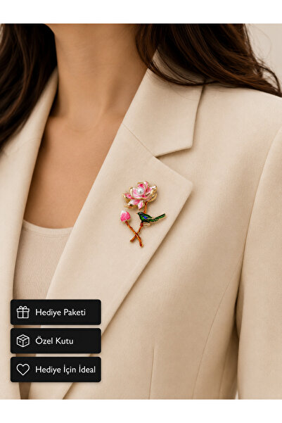 HER ŞEY NOTA www.herseynota.com Pembe Lotus ve İnci Detaylı Kuş Figürlü Kadın...