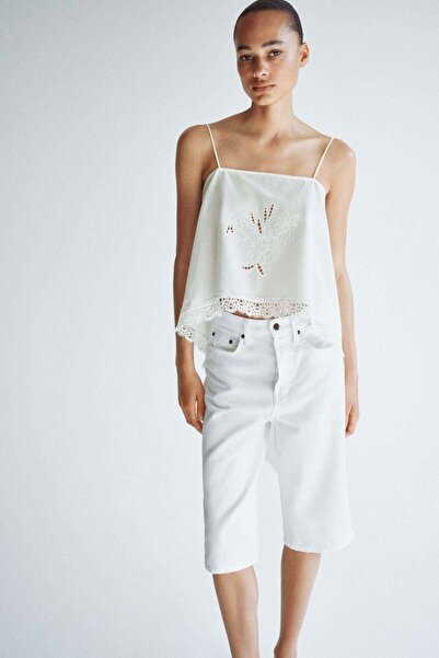 H&M بلوزة ملفوفة مزينة بالدانتيل