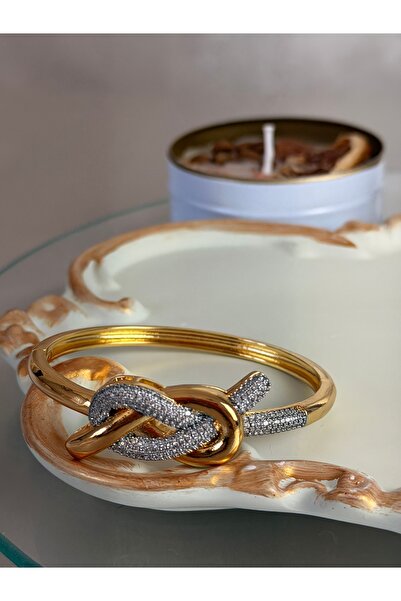 ANKA JEWELLRY GOLD RENK DÜĞÜM DETAYLI ZİRKON TAŞLI KADIN ÇELİK KELEPÇE BİLEKLİK