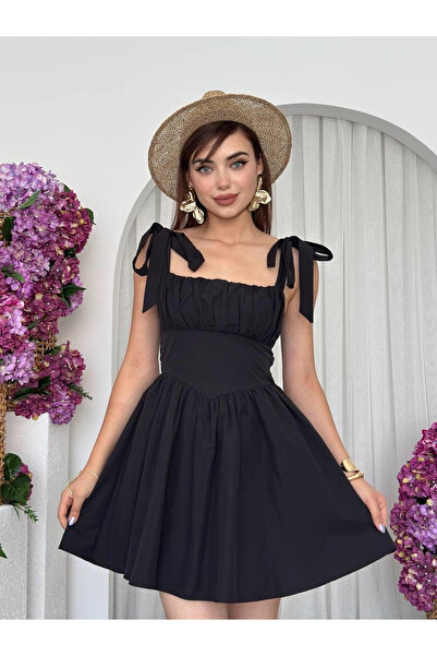 Moda Days فستان نسائي قصير أسود بتفاصيل ربط على الكتف وياقة مربعة من قماش الب...