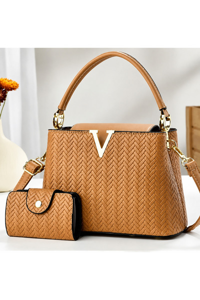 LV حقيبة كتف و يد نسائيه الهبه V