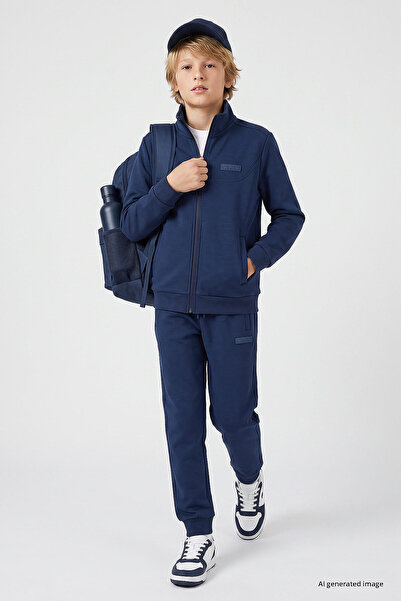TOMMY LIFE طقم بدلة رياضية للأولاد من Parlament Standard Fit Basic Dik Dik Ne...