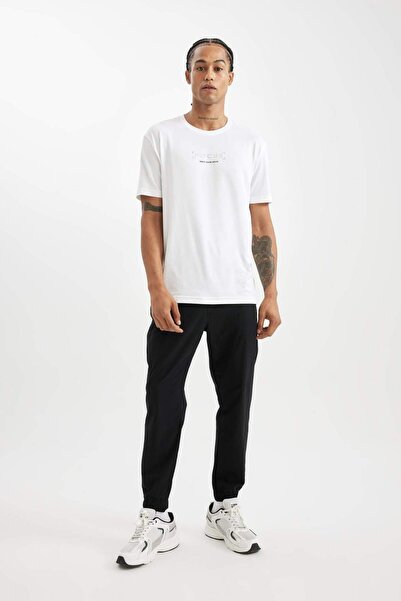 DeFacto Dokuma Esnek Multifonksiyonel Sporcu Jogger Eşofman Altı Slim Fit Dar...