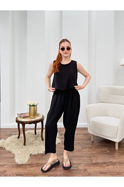 Dovil Women's Black Woven Double Set Sleeveless Blouse and Relaxed Cut Pants Set