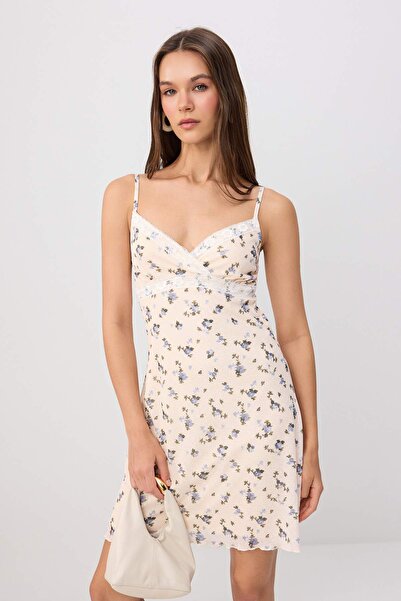 Trendyol Collection Rochie tricotată elastică, cu flori multicolore, în formă...