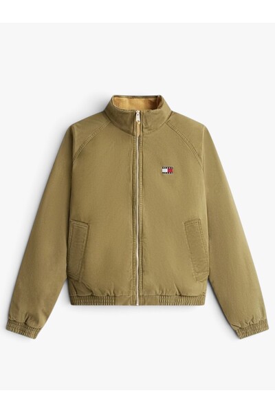 Tommy Hilfiger سترة مبطنة من القطن التويل من TJM للرجال باللون الأخضر - DM0DM...