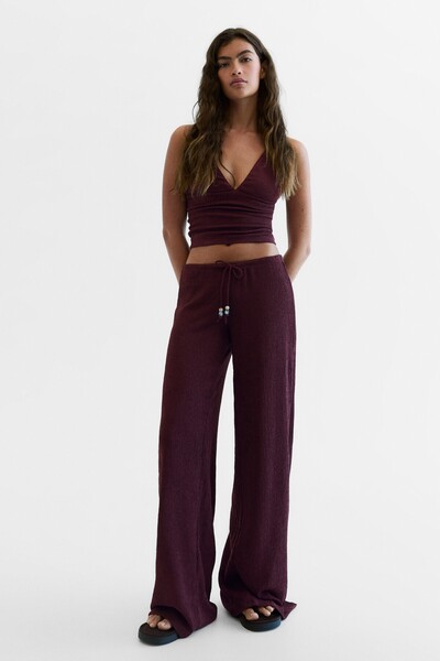 Bershka Beli lastikli geniş paça pantolon