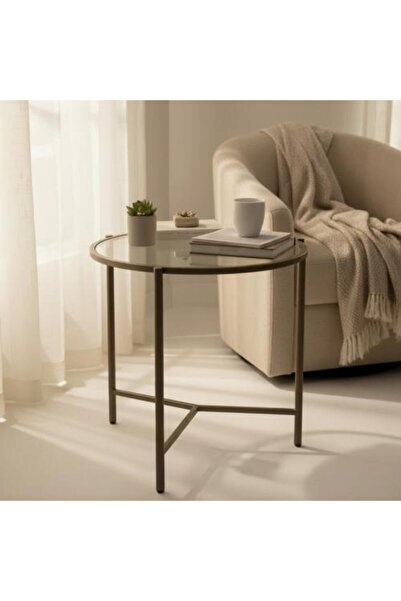 TELAL AL SHIFA Round side table with brass iron base and transparent brown glass