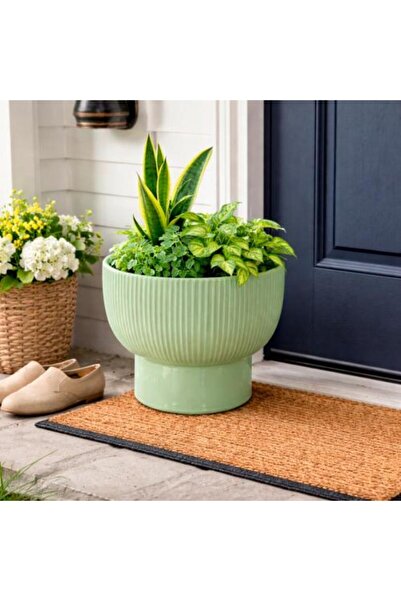 Generic Ceramic plant pot with raised base, light green color