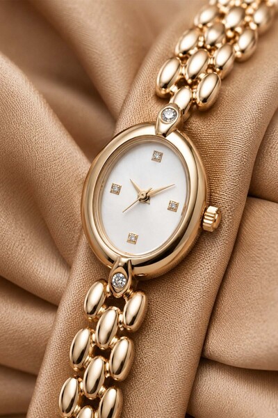 GANYMET Caliose Women's Gold Steel Band White Dial Stone Detailed Luxury Eleg...