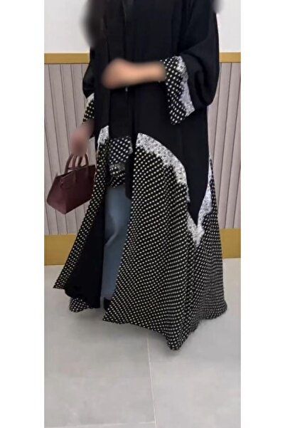 Rosana Abaya Brzen, with the Design of the Striped Abaya