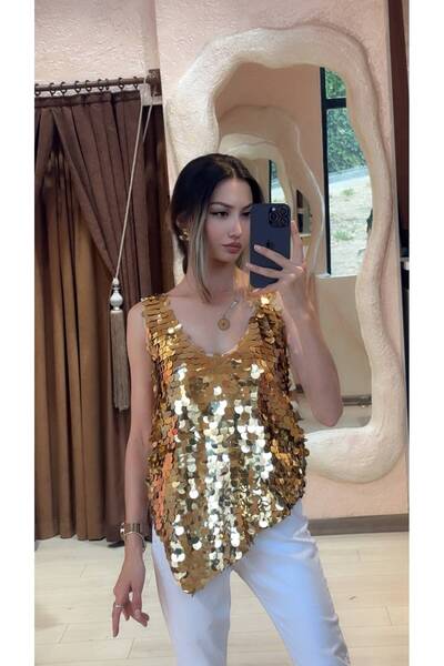 SÜSLÜ BUTİK ASİMETRİK KESİM PUL PAYET BLUZ