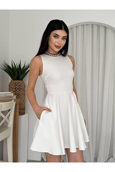 Moda Days فستان نسائي أبيض قصير بياقة دائرية بدون أكمام مع جيوب وتنورة واسعة ...