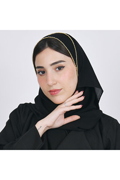 HAWRAA ABAYA Black Silk with a Small Round Gold Pattern.