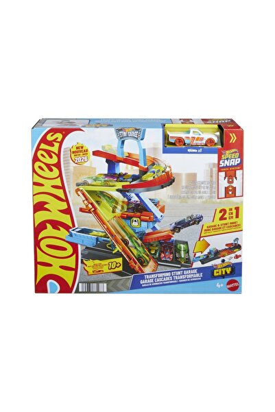mattel HOT WHEELS GARAJ DE TRUCURI URBANE CU TRANSFORMAȚIE, MAȘINA INCLUSĂ