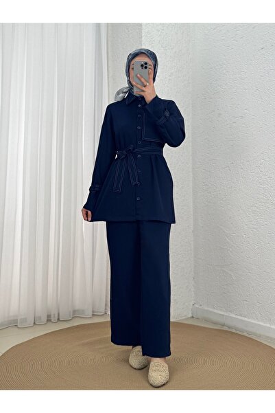 Holehola Costum cu pantaloni și curea cu mâneci segmentate pe o singură parte...