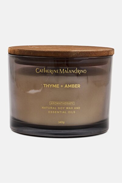 Catherine Malandrino شمعة معطرة بالزعتر والعنبر 340 جرام، رمادية اللون