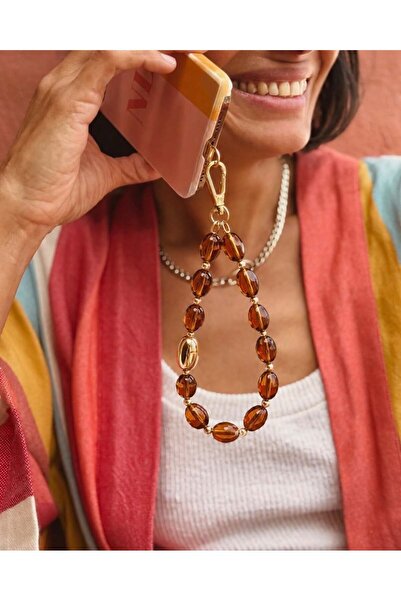Les Petites Mains Les Petites Amber Charm – Gold Detaylı Çanta & Telefon Askısı