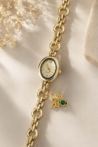 The Watch Women's Golden Yellow Oval Case Chain Watch with Green Stone Bee Fi...