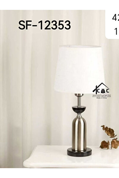 Generic This Is a Modern Table Lamp with a Silver Metal Base and a White Shade.
