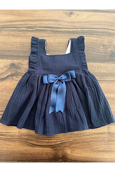 ELYA BUTİK Kız bebek (aylık) müslin fiyonklu elbise