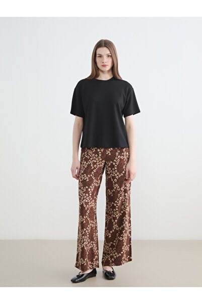 LC Waikiki Pantaloni de damă cu talie elastică și imprimeu