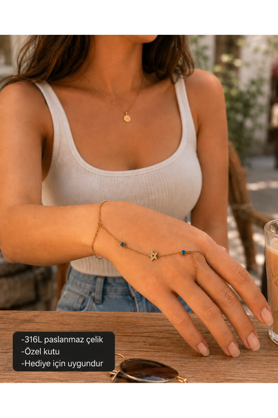 HER ŞEY NOTA www.herseynota.com Celestia Nazar Hand Chain Bracelet with Star ...