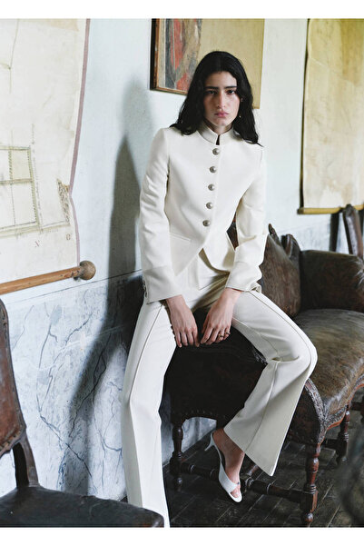 MANGO Woman Dikişli flare pantolon