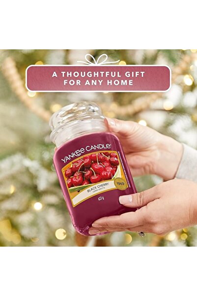 Yankee Candle شمعة كبيرة كلاسيكية بوزن 22 أونصة برائحة الكرز الأسود، ذات فتيل...