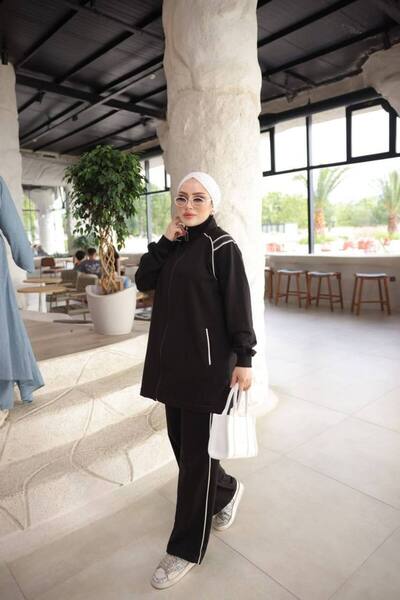 estilowear طقم بدلة رياضية نسائية بتفاصيل سحاب وخطوط - طقم رياضي مكون من قطعتين