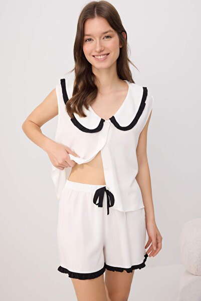 Trendyol Collection Set de pijamale țesute Shally Animal Ecru THMSS26PT00040