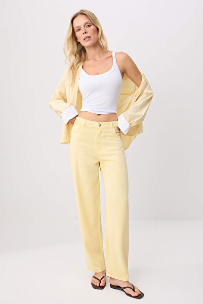 Trendyol Collection جينز أصفر فاتح عالي الخصر مصنوع من القطن بنسبة 100% غير ق...