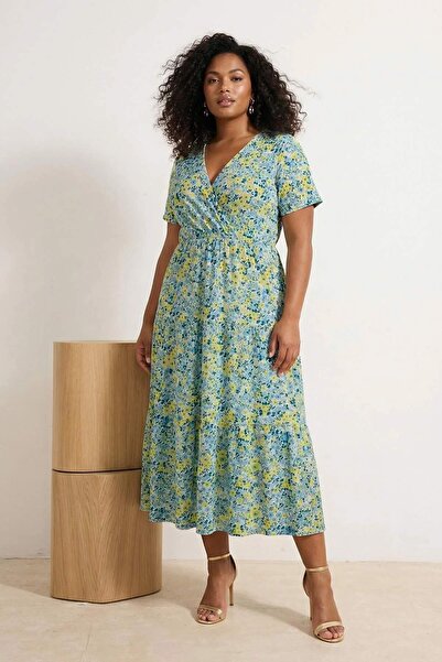 Trendyol Curve Rochie tricotată midi cu imprimeu floral galben, cu două piept...