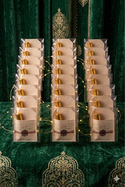 GIFT توزيعات الحج 12 قطعه من المسك والعود بجيب جلدي انيق