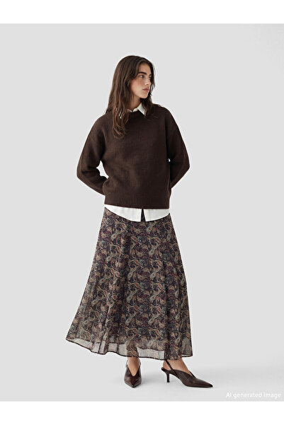 LC Waikiki تنورة نسائية متوسطة الطول من LCW Modest باللون الأسود مع نمط مميز ...