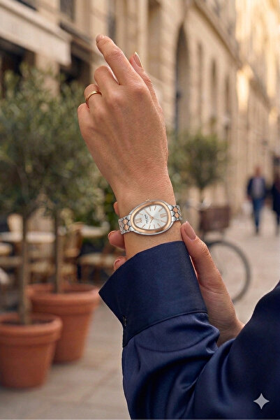 Tom Jones London ساعة يد نسائية فاخرة بتصميم بيضاوي خاص وأرقام رومانية وسوار ...
