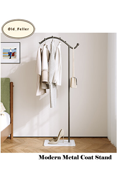 Old_Feller Nordic-style freestanding metal coat rack in a seahorse design, id...