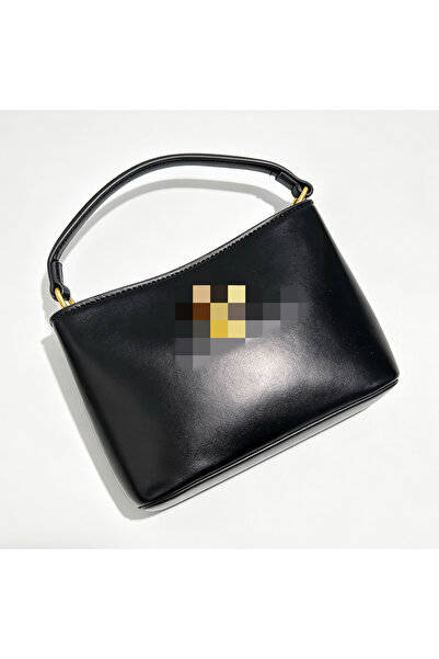 Bleco Simple commuter handbag with a small water bucket.