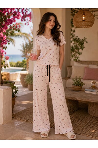 H Women's pajama set with a soft and elegant design inspired by sophisticated...
