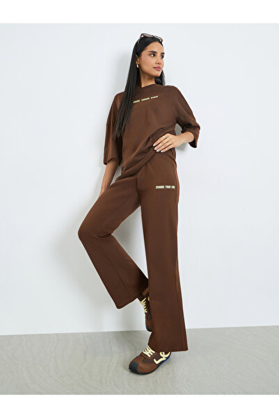 Styli Brown Printed T-Shirt and Flared Leggings Co-Ords