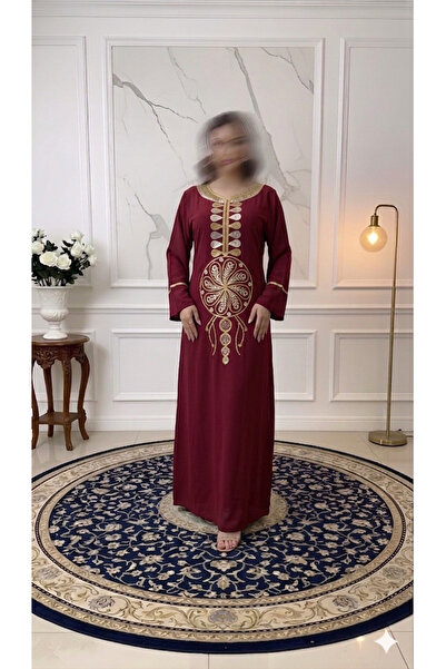 ISHRAQAT AL-AMAL Elegant dress with luxurious gold embroidery