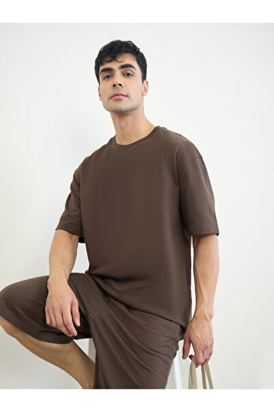 Styli Men Slogan Print Oversized T-Shirt and Shorts Set