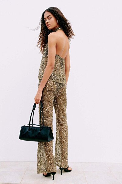 H&M Sequined net trousers
