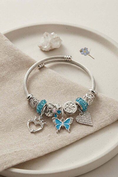 Inure Jewelry سوار فضي اللون مع حلية على شكل فراشة زرقاء وقلب