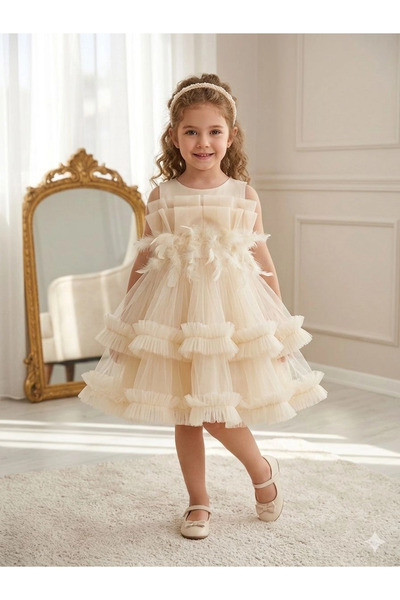 Orca Kids Fashion فستان سهرة بتفاصيل ريشية من 2-10 دريب تيودر كريمي