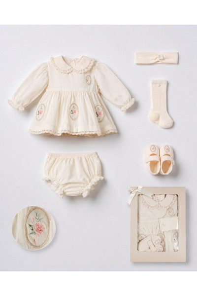 sunshine boutique15 بكج مواليد لون بيج مزين بطبعه ورد يلبس مواليد لعمر 4 اشهر