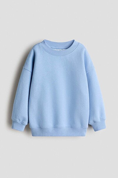 H&M بلوزة كبيرة الحجم برقبة دائرية